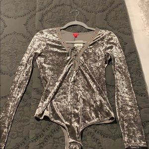 Guess body suit, brand new. Never worn. Size small